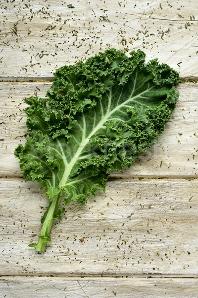 kale leaf on a rustic wooden table Stock photo © nito