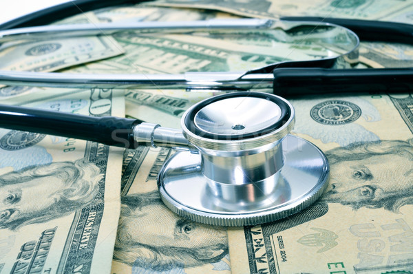 Stock fotó: Egészségügy · ipar · sztetoszkóp · köteg · dollár · bankjegyek · pénz