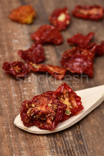 sun-dried tomatoes on a wooden table Stock photo © nito