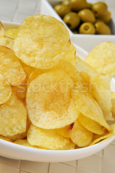 Stock photo: potato chips and olives