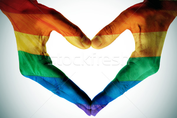 Eşcinsel sevmek adam eller boyalı gökkuşağı Stok fotoğraf © nito