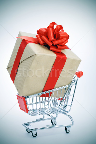 huge gift in a shopping cart Stock photo © nito