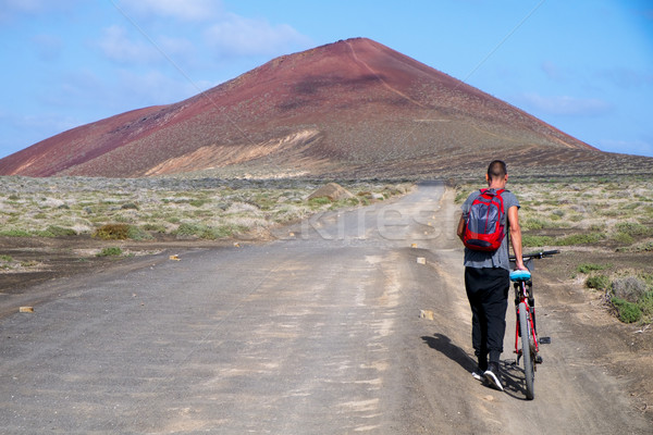 man with a bike in La Graciosa, Spain Stock photo © nito