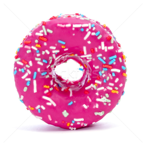 donut coated with a pink frosting and sprinkles of different col Stock photo © nito