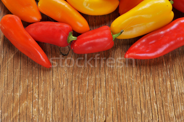 sweet peppers of different colors on a rustic table Stock photo © nito
