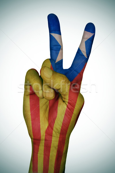 V sign patterned with the Catalan pro-independence flag Stock photo © nito