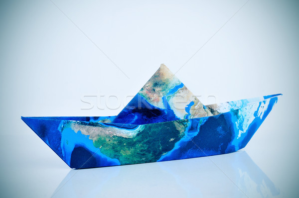 paper boat made with a world map (furnished by NASA) Stock photo © nito