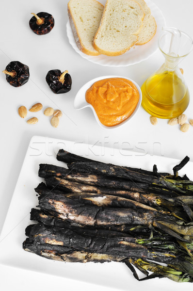 barbecued calcots, sweet onions, and romesco sauce typical of Ca Stock photo © nito