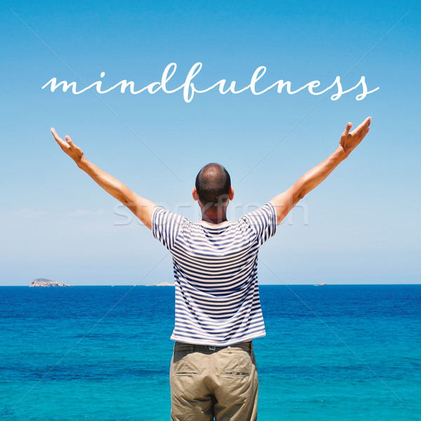 man saluting the new day and the text mindfulness Stock photo © nito
