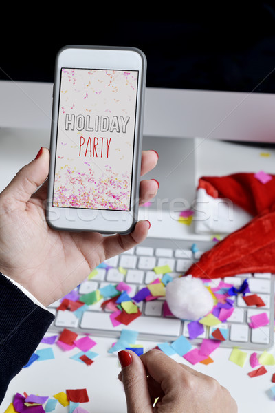 text holiday party in a smartphone Stock photo © nito