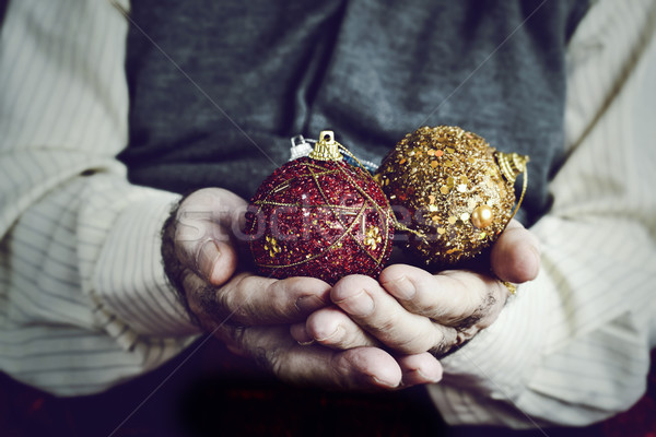 old man with christmas balls in his hands Stock photo © nito