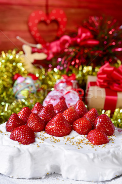 christmas cake covered with cream and topped with strawberries Stock photo © nito