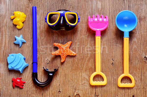 summer stuff, such as a diving or beach toys, on a rustic wooden Stock photo © nito