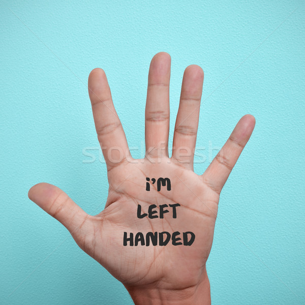 Stock photo: text I am left-handed in the palm of the hand