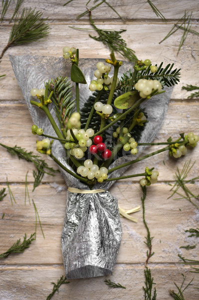 bunch of mistletoe on a wooden surface Stock photo © nito
