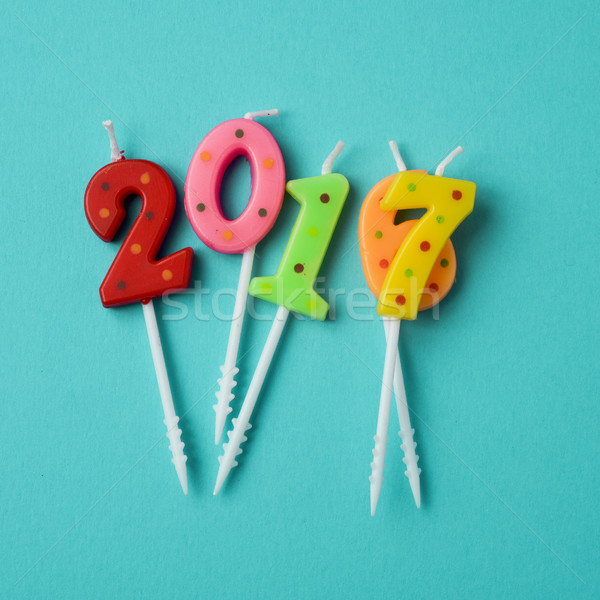 Aantal nieuwjaar shot kaarsen verschillend kleuren Stockfoto © nito