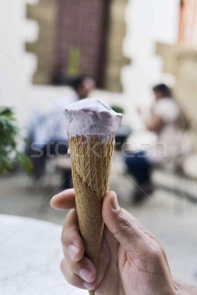 young man with an ice cream outdoors Stock photo © nito