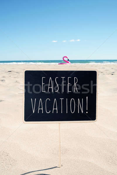 text easter vacation in a signboard on the beach Stock photo © nito