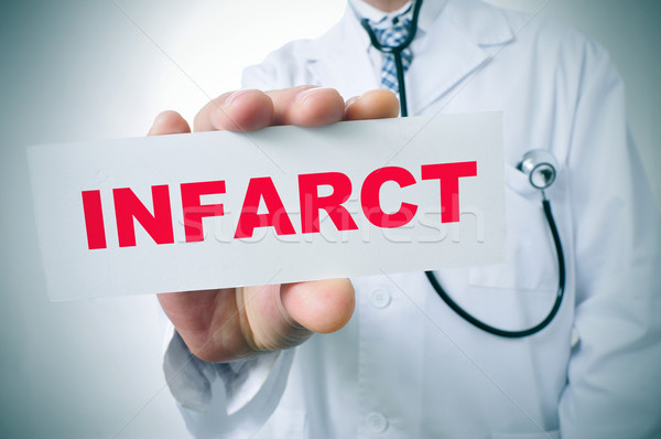 doctor with a signboard with the word infarct Stock photo © nito