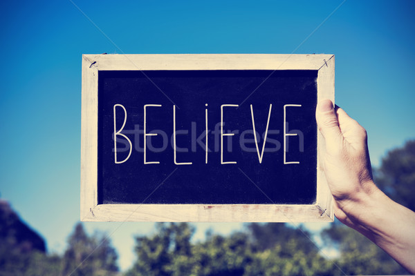chalkboard with the text believe, filtered Stock photo © nito