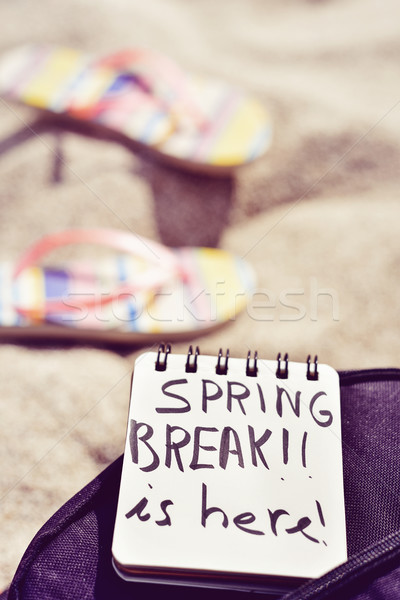 Stock photo: text spring break is here in a notepad