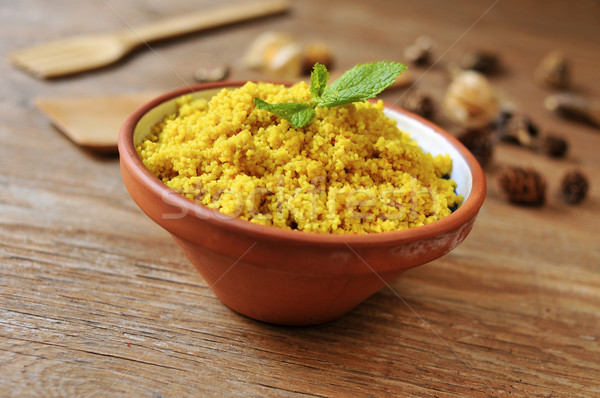 spiced couscous on a rustic wooden table Stock photo © nito