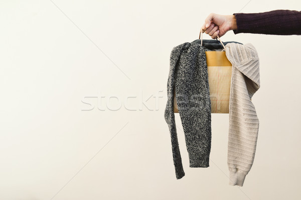 man with a shopping bag with clothes Stock photo © nito