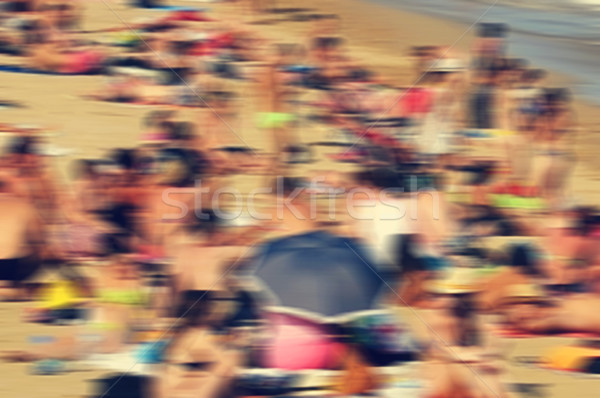 defocused blur background of a packed beach Stock photo © nito