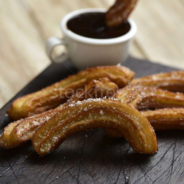 churros con chocolate, a typical Spanish sweet snack Stock photo © nito