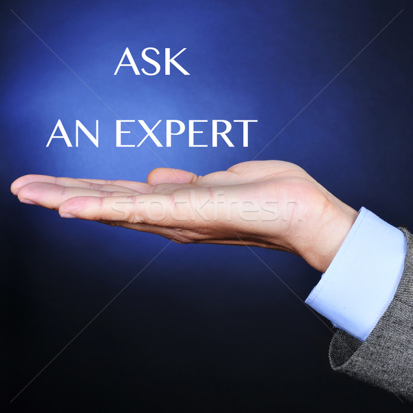 the text ask an expert on a man hand Stock photo © nito
