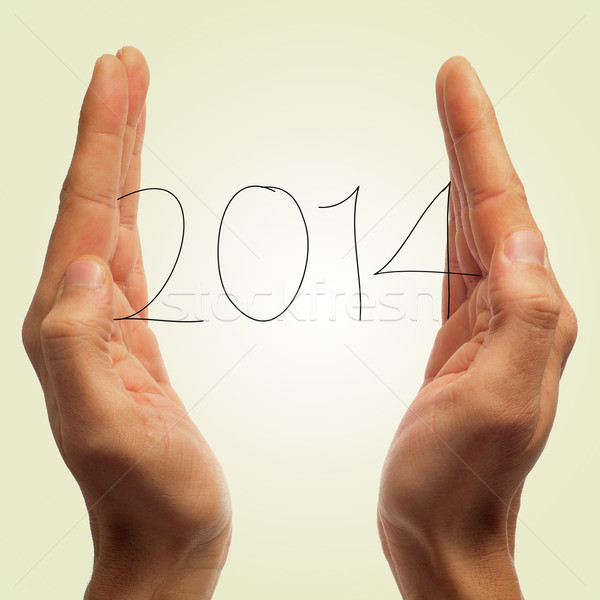 Foto stock: 2014 · año · nuevo · hombre · número · manos · blanco