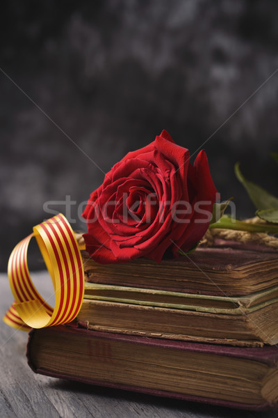 red rose, catalan flag and old books Stock photo © nito