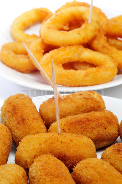spanish croquettes and calamares a la romana, breaded and fried  Stock photo © nito