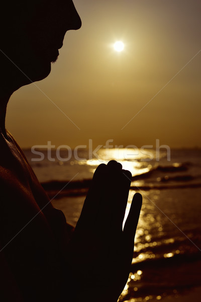 Stock photo: man with his hands put together