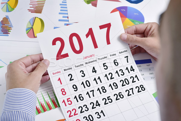 young businessman with a 2017 calendar Stock photo © nito