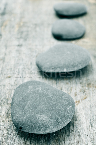 stones on an old wooden surface Stock photo © nito