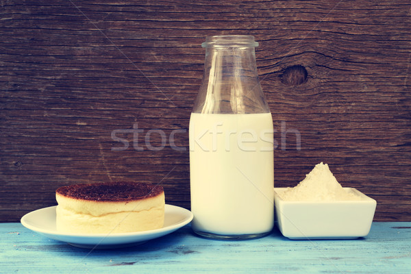 cheesecake and the ingredients to prepare it, with a filter effe Stock photo © nito