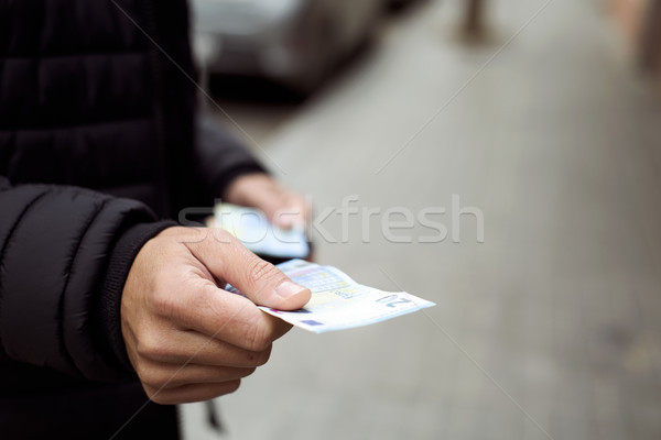man giving a twenty euro note Stock photo © nito