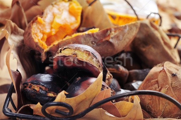 Stock photo: roasted chestnuts and roasted sweet potatoes in a basket