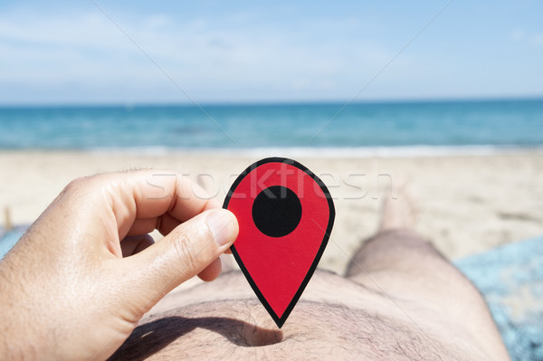 man with a red marker in his hand on the beach Stock photo © nito