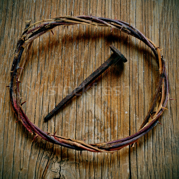 the crown of thorns of Jesus Christ and a nail on the Holy Cross Stock photo © nito