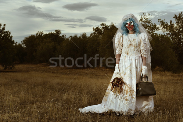Ijesztő gonosz bohóc menyasszony ruha visel Stock fotó © nito
