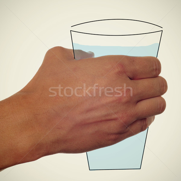 man hand with a glass of water in his hand Stock photo © nito