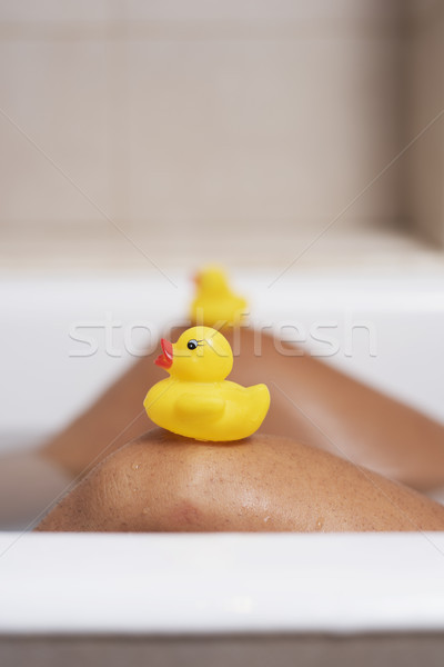 Homme détente baignoire caoutchouc jambes Photo stock © nito