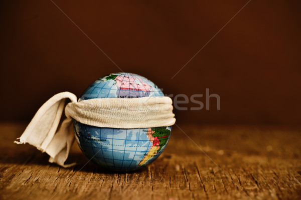 piece of cloth tied around a terrestrial globe Stock photo © nito