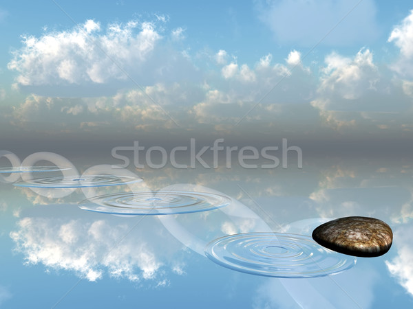Stock photo: ricochets of a stone on water 