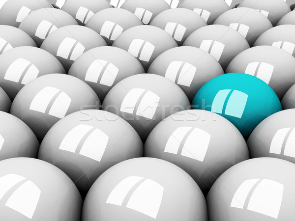 Stock photo: white  balls and one blue ball