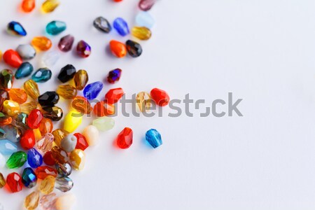 Beautiful glass beads closeup on white background Stock photo © Nneirda