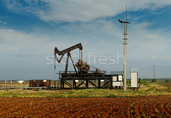Operating oil and gas well  Stock photo © Nneirda