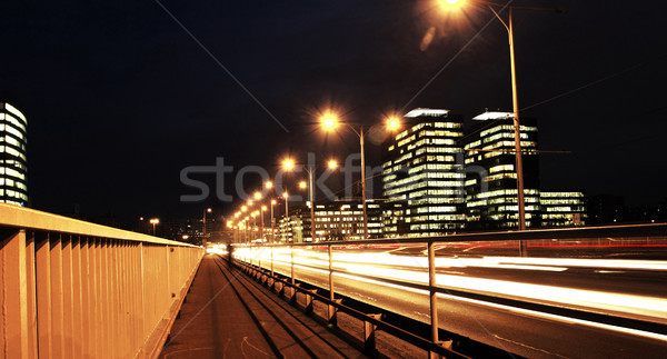 Fast moving cars at night Stock photo © Nneirda